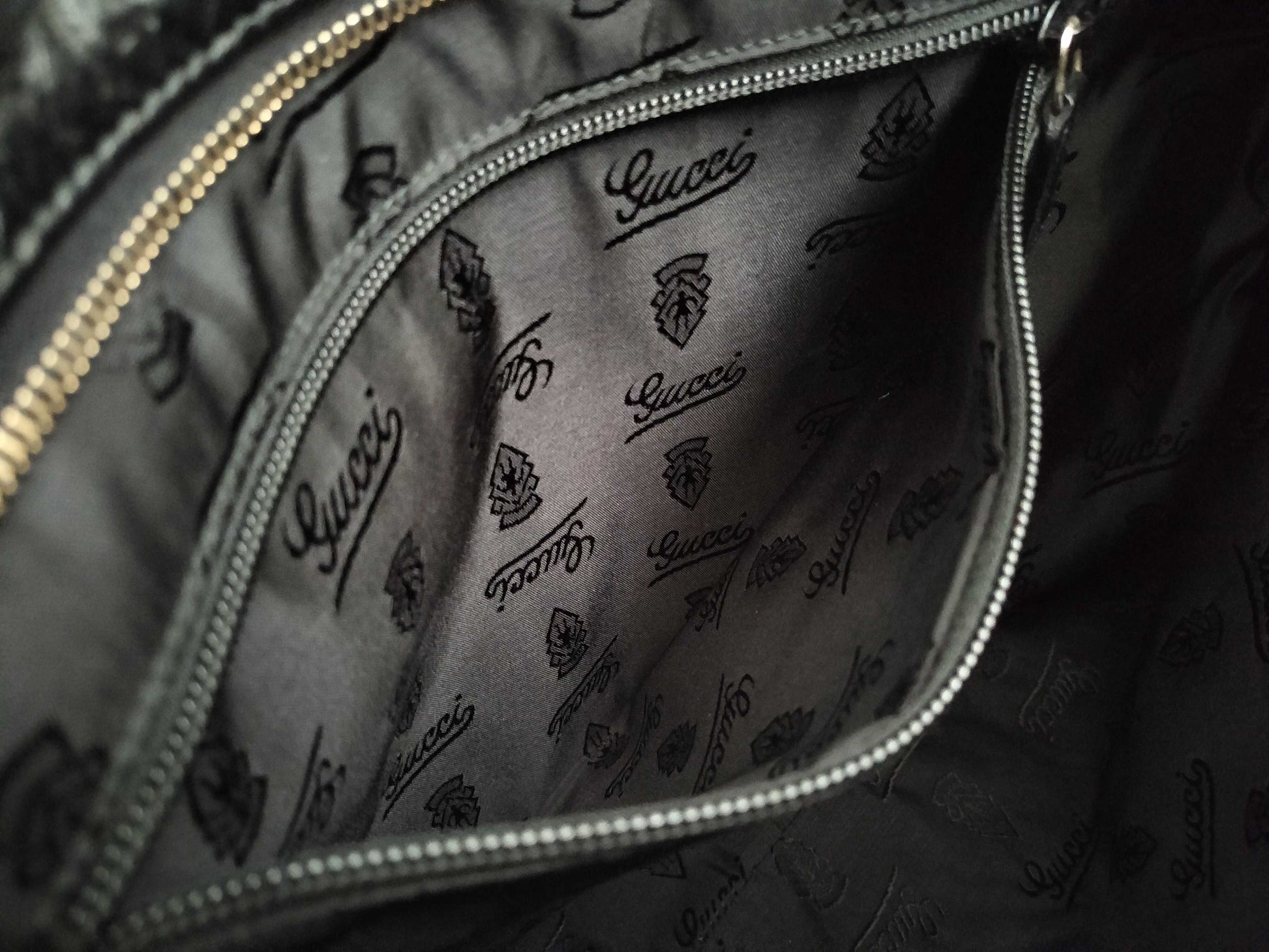 GUCCI Guccissima Leather Shoulder Bag with GG Pattern and Logo Plate 201446