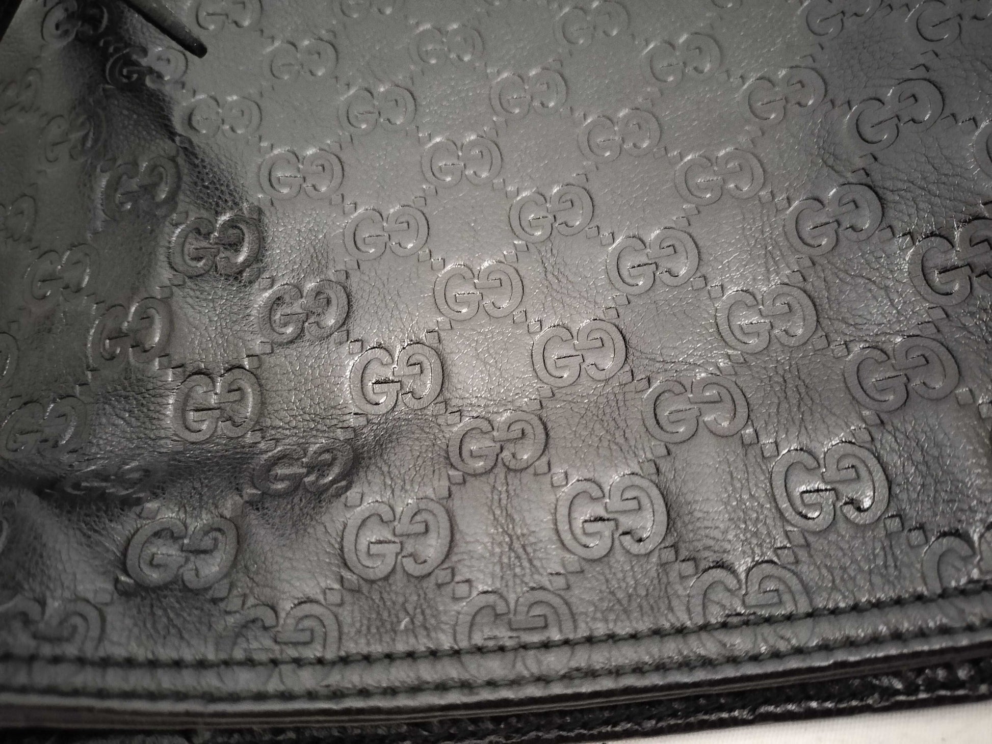 GUCCI Guccissima Leather Shoulder Bag with GG Pattern and Logo Plate 201446