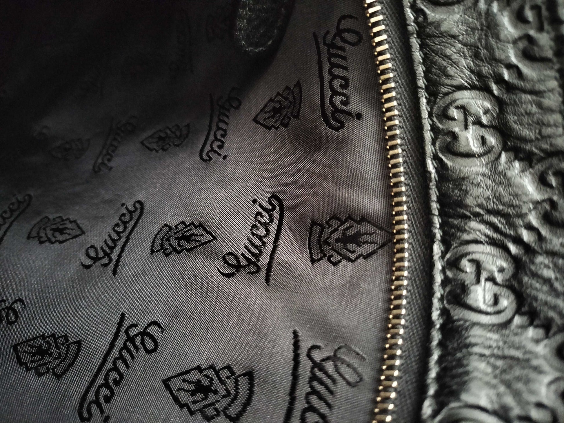 GUCCI Guccissima Leather Shoulder Bag with GG Pattern and Logo Plate 201446