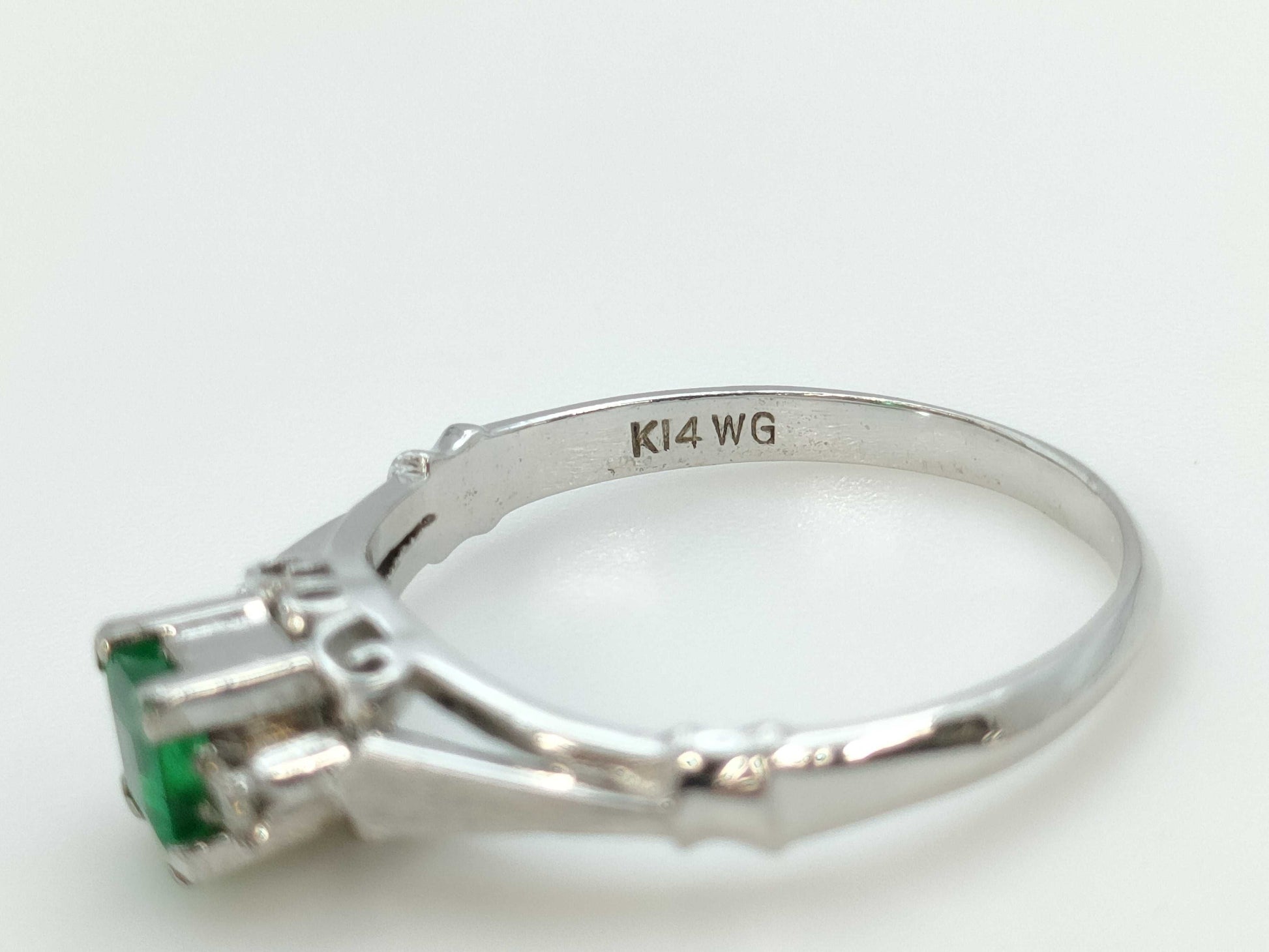 Emerald and Diamond K14WG 1.7g Ring 