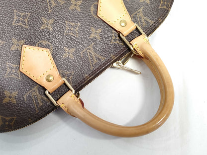 LOUIS VUITTON Monogram Alma Monogram Handbag