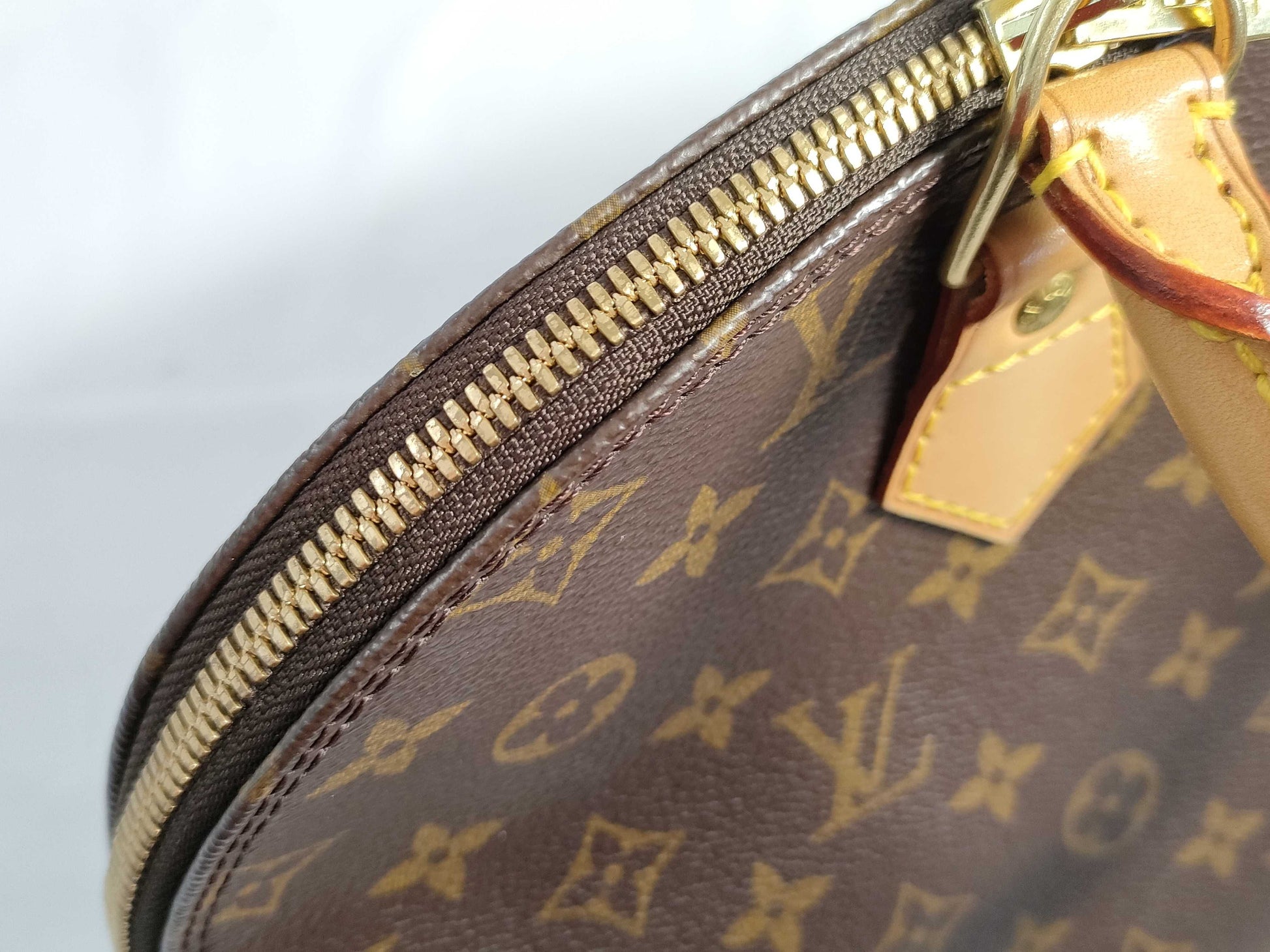 LOUIS VUITTON Monogram Alma Monogram Handbag