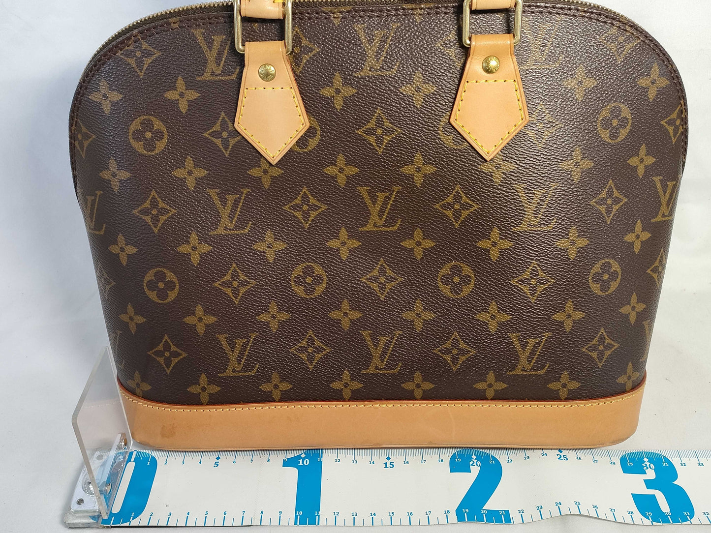 LOUIS VUITTON Monogram Alma Monogram Handbag