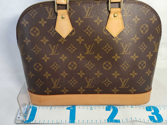 LOUIS VUITTON Monogram Alma Monogram Handbag