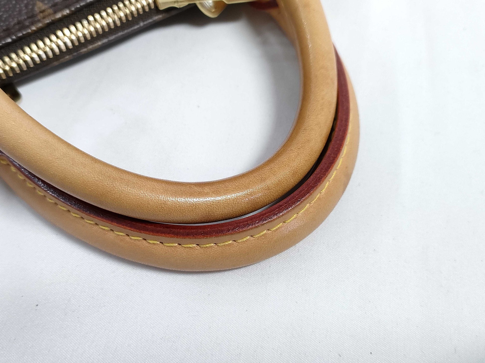 LOUIS VUITTON Monogram Alma Monogram Handbag