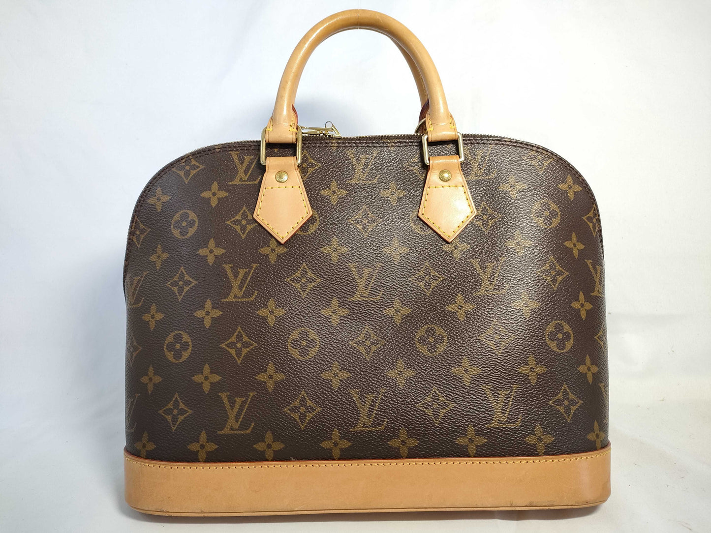LOUIS VUITTON Monogram Alma Monogram Handbag