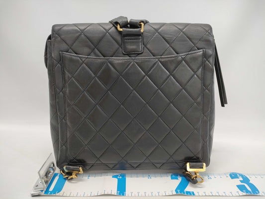 CHANEL Lambskin Black Backpack with Seal