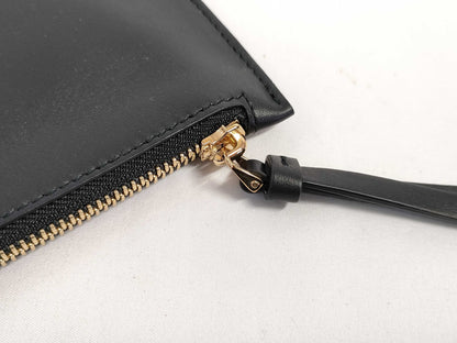 Salvatore Ferragamo black pouch with case
