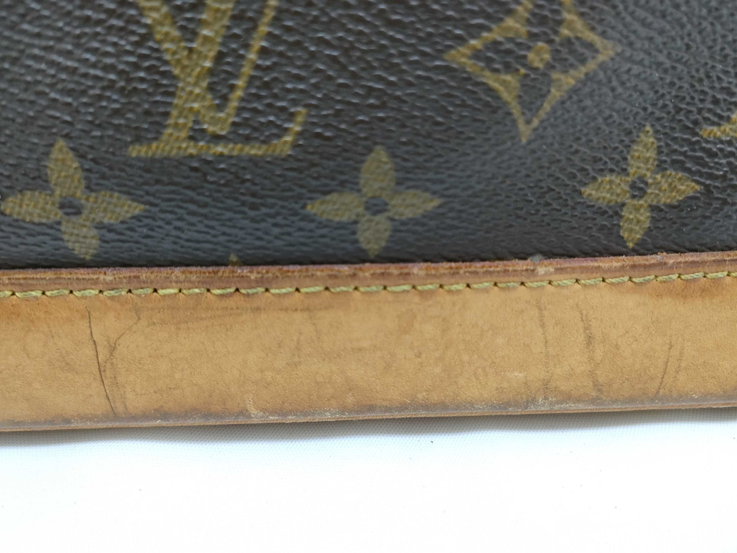 LOUIS VUITTON RFID verification failed. Monogram Louis Vuitton Monogram Alma handbag.
