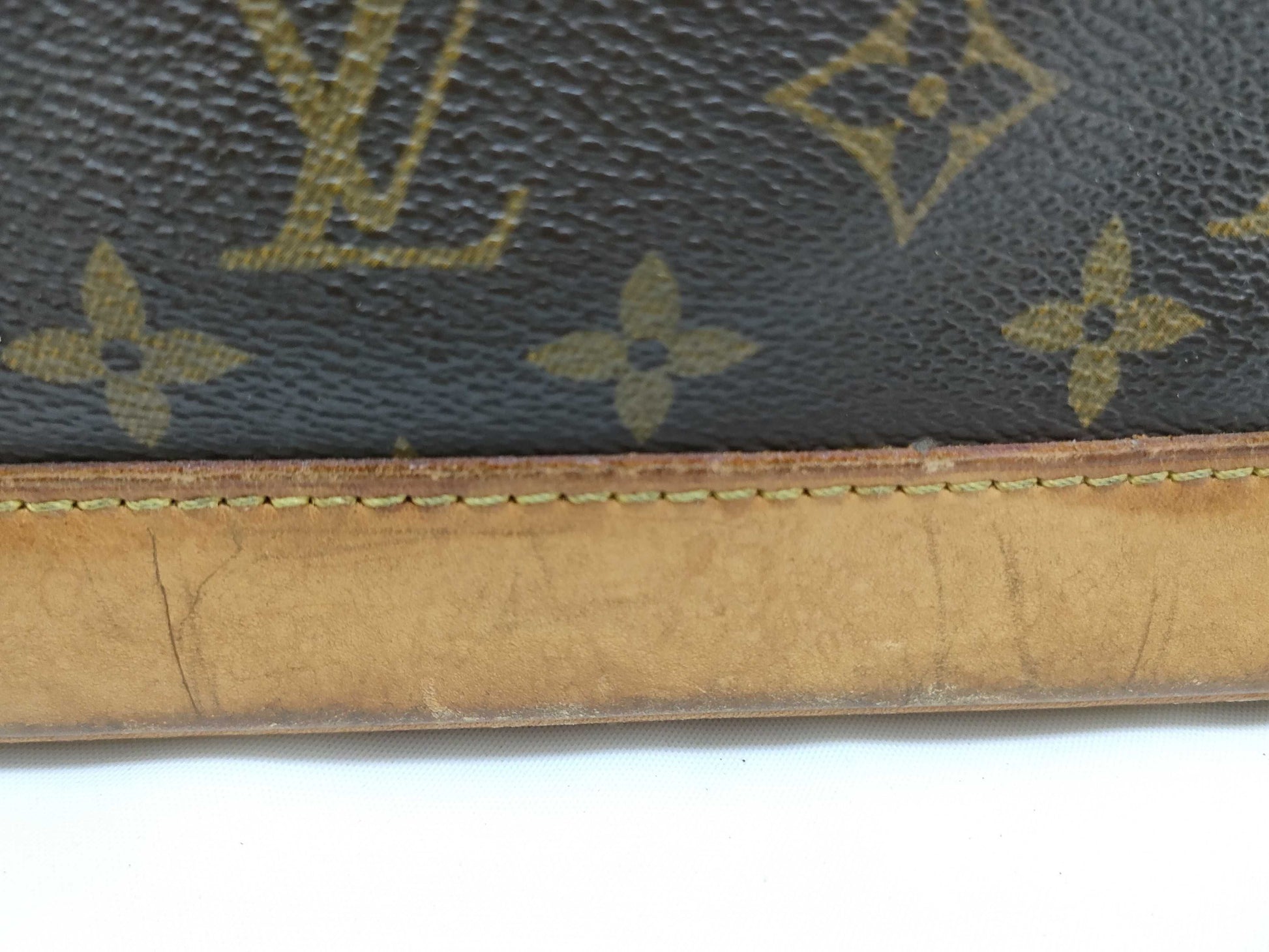LOUIS VUITTON RFID verification failed. Monogram Louis Vuitton Monogram Alma handbag.