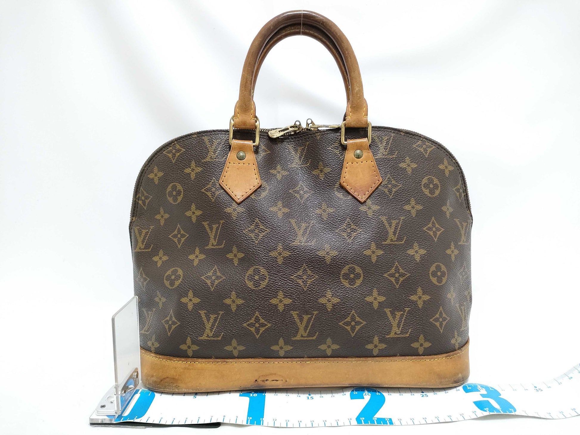 LOUIS VUITTON RFID verification failed. Monogram Louis Vuitton Monogram Alma handbag.