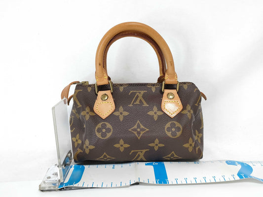 LOUIS VUITTON RFID Unverifiable, Serial Unverifiable, Monogram Louis Vuitton Mini Speedy Monogram Pouch with Tag, No ST