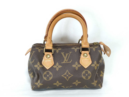 LOUIS VUITTON RFID Unverifiable, Serial Unverifiable, Monogram Louis Vuitton Mini Speedy Monogram Pouch with Tag, No ST