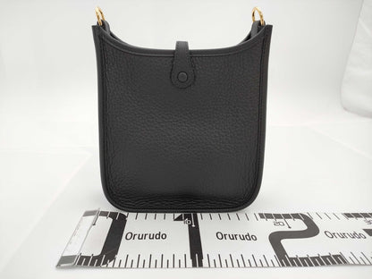 HERMES Evelyn TPM W Stamp Taurillon Clemence Leather Shoulder Bag with Short Strap Noir and Gold Hardware