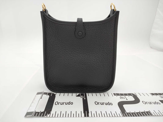 HERMES Evelyn TPM W Stamp Taurillon Clemence Leather Shoulder Bag with Short Strap Noir and Gold Hardware