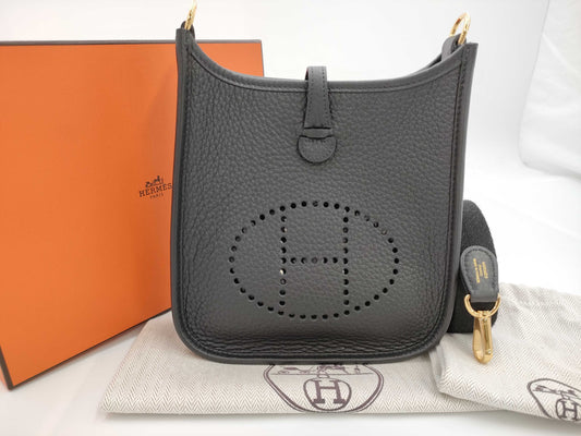HERMES Evelyn TPM W Stamp Taurillon Clemence Leather Shoulder Bag with Short Strap Noir and Gold Hardware