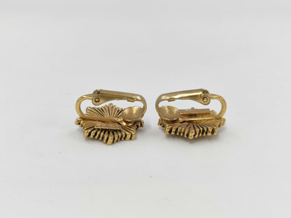 CHANEL engraved Coco Mark medal motif earrings