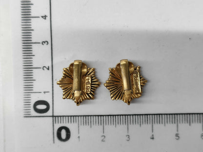 CHANEL engraved Coco Mark medal motif earrings
