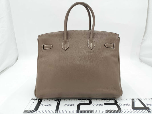 HERMES Birkin 35 in Taurillon Clemence Etoupe leather with silver hardware, N stamped.