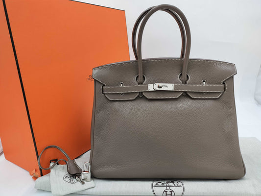 HERMES Birkin 35 in Taurillon Clemence Etoupe leather with silver hardware, N stamped.