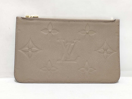 LOUIS VUITTON RFID verification impossible. Serial number verification impossible. Monogram Empreinte Louis Vuitton Neverfull Pouch in Taupe with Gold Hardware.
