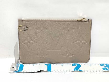 LOUIS VUITTON RFID verification impossible. Serial number verification impossible. Monogram Empreinte Louis Vuitton Neverfull Pouch in Taupe with Gold Hardware.