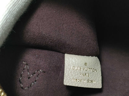 LOUIS VUITTON RFID verification impossible. Serial number verification impossible. Monogram Empreinte Louis Vuitton Neverfull Pouch in Taupe with Gold Hardware.