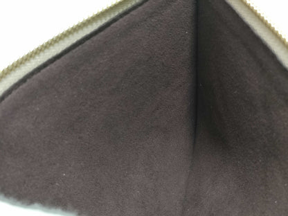 LOUIS VUITTON RFID verification impossible. Serial number verification impossible. Monogram Empreinte Louis Vuitton Neverfull Pouch in Taupe with Gold Hardware.
