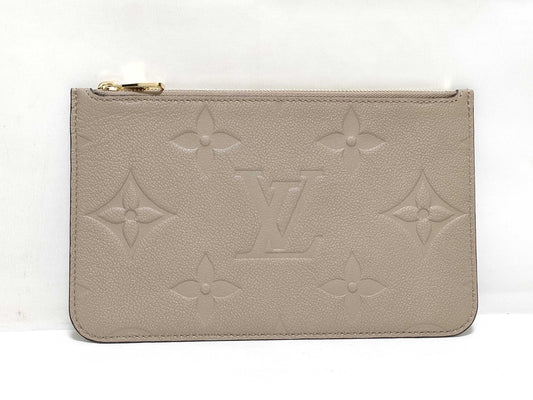 LOUIS VUITTON RFID verification impossible. Serial number verification impossible. Monogram Empreinte Louis Vuitton Neverfull Pouch in Taupe with Gold Hardware.