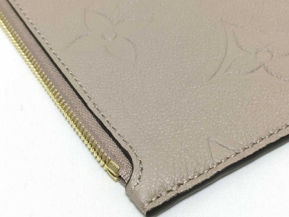 LOUIS VUITTON RFID verification impossible. Serial number verification impossible. Monogram Empreinte Louis Vuitton Neverfull Pouch in Taupe with Gold Hardware.