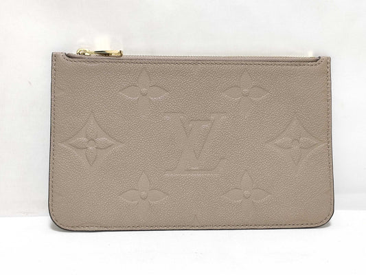 LOUIS VUITTON RFID verification impossible. Serial number verification impossible. Monogram Empreinte Louis Vuitton Neverfull Pouch in Taupe with Gold Hardware.
