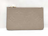 LOUIS VUITTON RFID verification impossible. Serial number verification impossible. Monogram Empreinte Louis Vuitton Neverfull Pouch in Taupe with Gold Hardware.