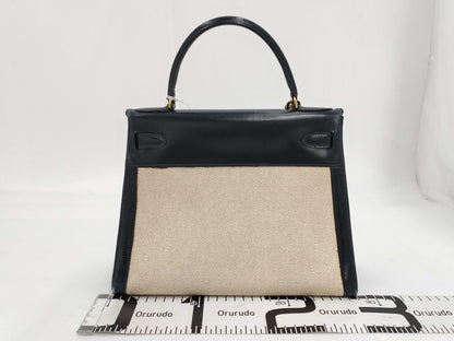 HERMES Kelly 28 Handbag, Toile H, Gold Hardware, Gold