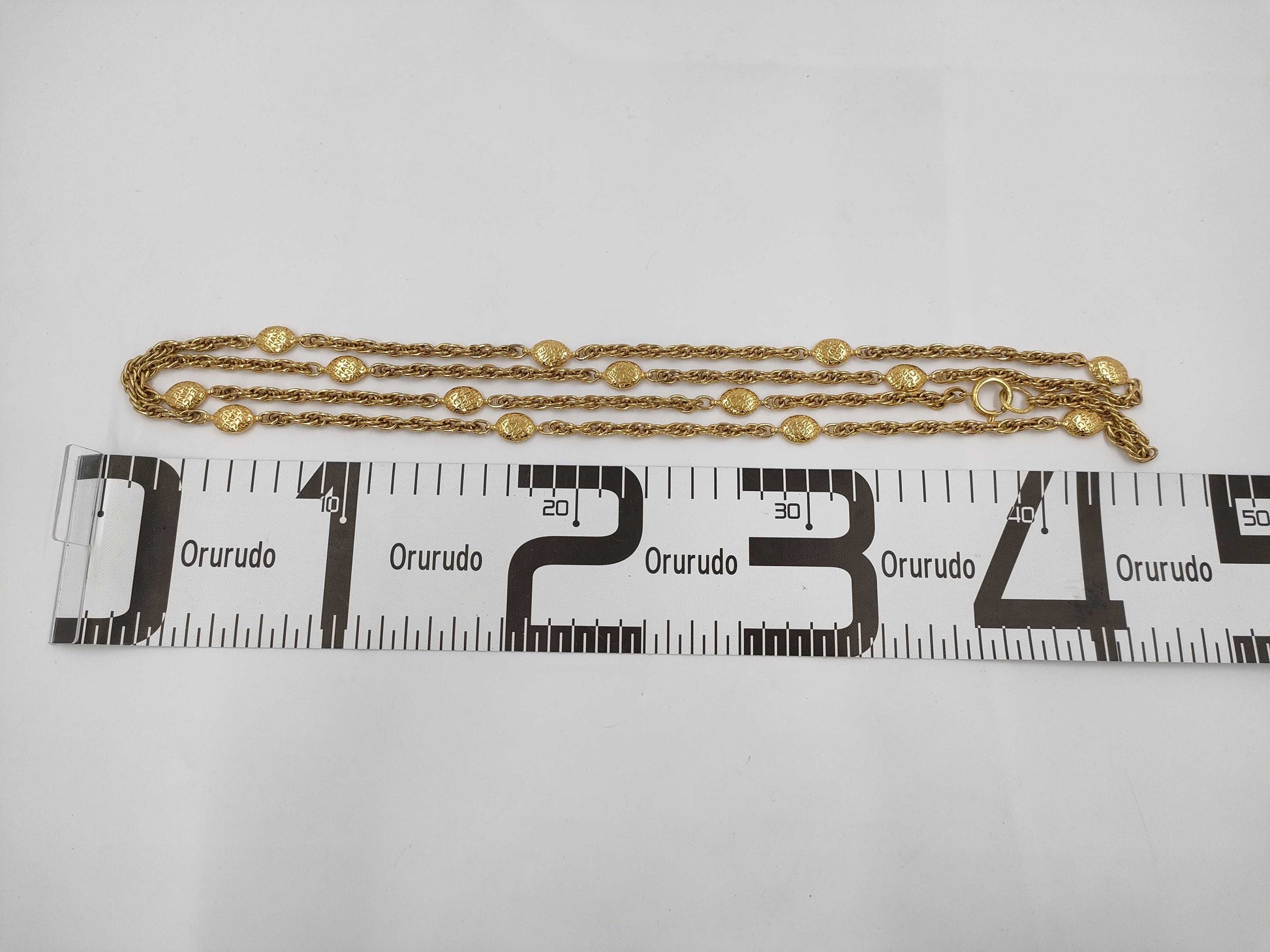 CHANEL Gold Logo Necklace