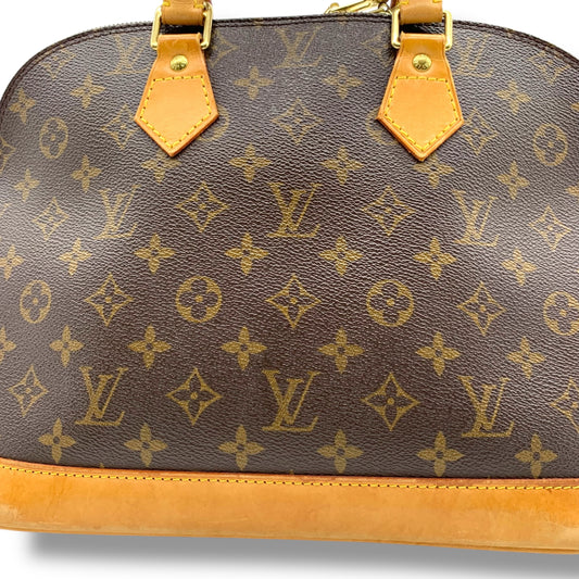 LOUIS VUITTON Alma Monogram Handbag