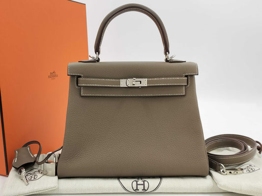 HERMES Kelly 25 Togo Etoupe Handbag, engraved with B, 2023
