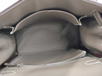 HERMES Kelly 25 Togo Etoupe Handbag, engraved with B, 2023