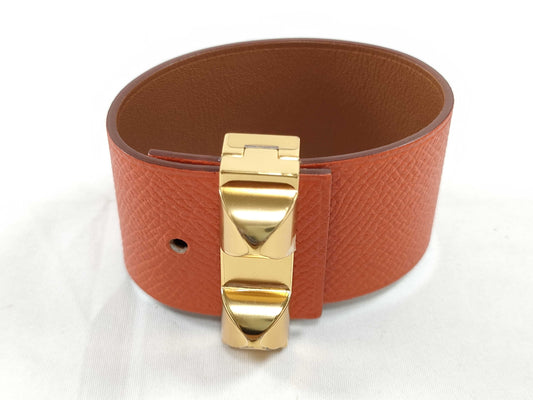 HERMES engraved X Hermes Medor X engraved PM bracelet with metal film.