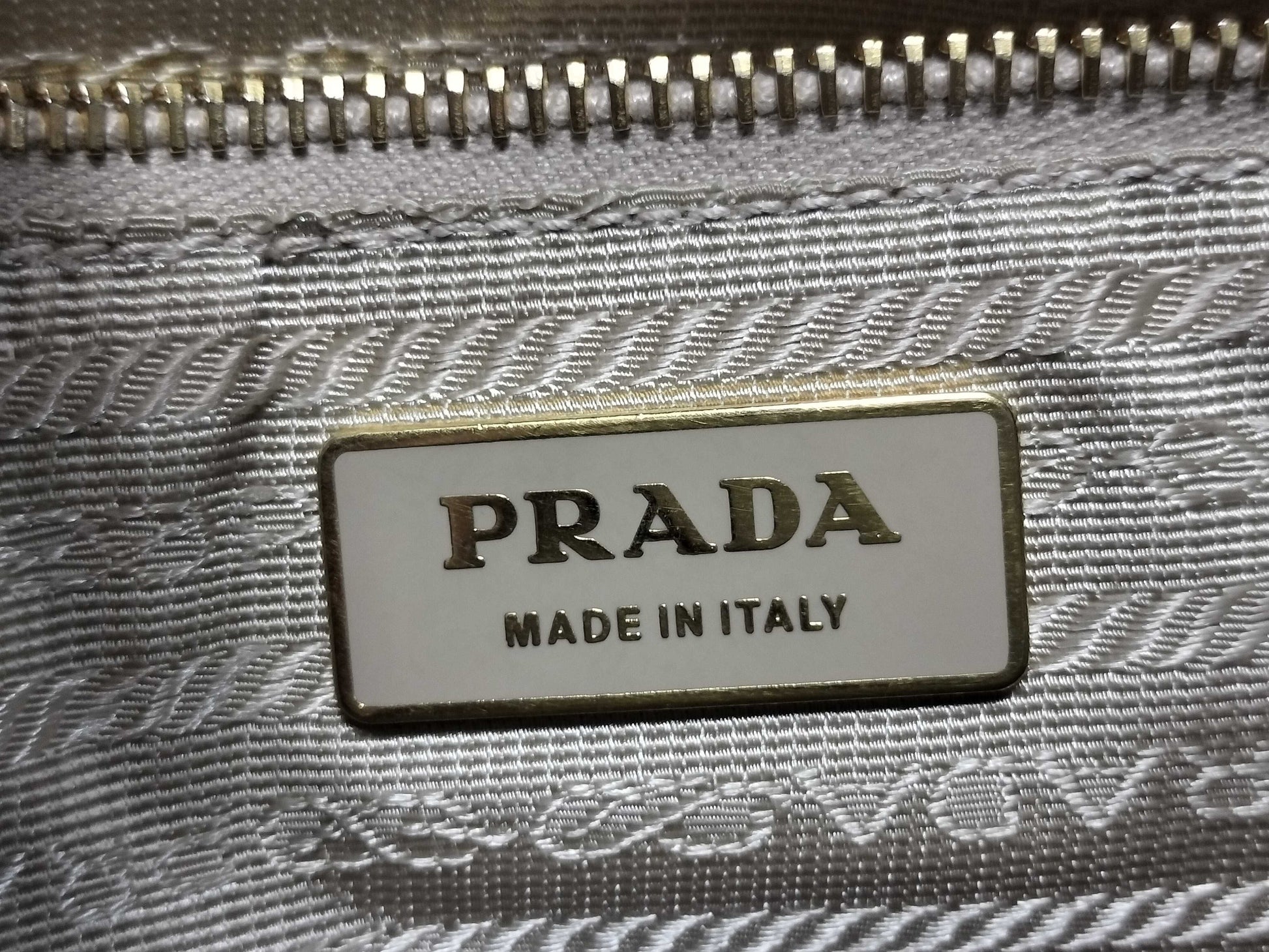 PRADA nylon and leather shoulder bag with white tag