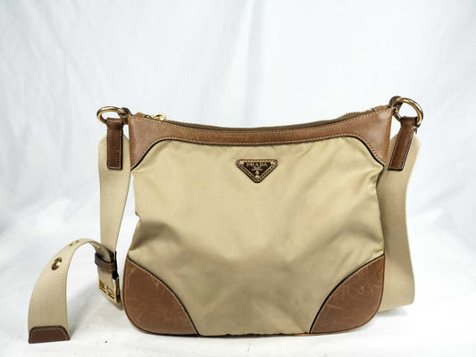 PRADA nylon and leather shoulder bag with white tag