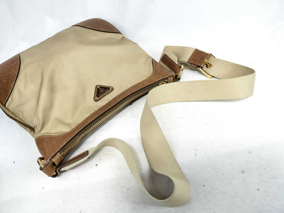 PRADA nylon and leather shoulder bag with white tag