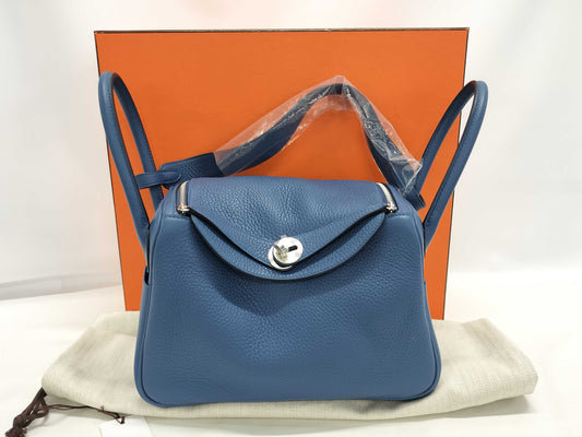 HERMES Lindy 26 Blue Tie Handbag in Taurillon Clemence Leather with Silver Hardware and K Stamp