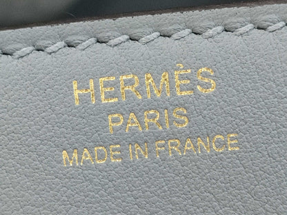 HERMES Birkin 25 in Platinum with Swift Champagne Gold Hardware and K Stamp.