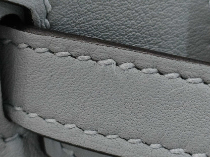 HERMES Birkin 25 in Platinum with Swift Champagne Gold Hardware and K Stamp.