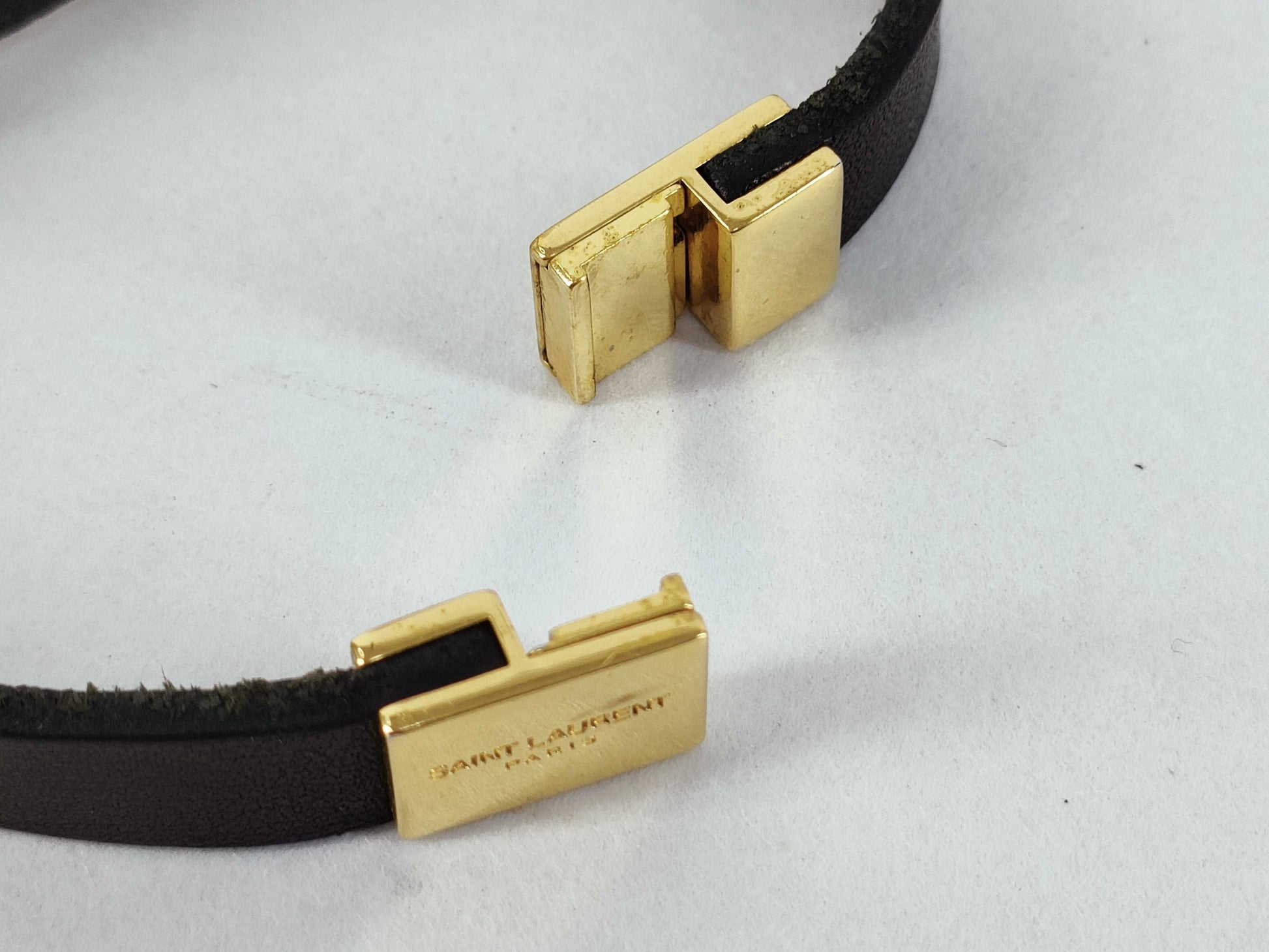 Yves Saint Laurent Cassandra Logo Bracelet in Leather, Black and Gold