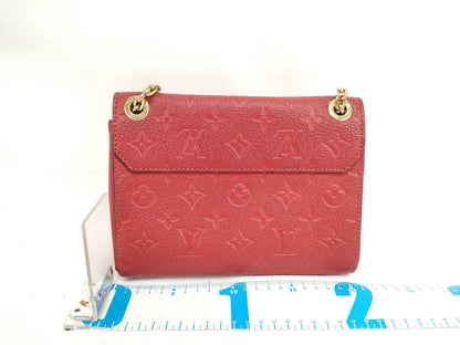 LOUIS VUITTON TR 3109 Monogram LOUIS VUITTON Monogram Empreinte Vavin PM RFID Enabled Shoulder Bag