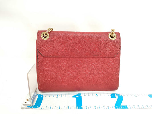 LOUIS VUITTON TR 3109 Monogram LOUIS VUITTON Monogram Empreinte Vavin PM RFID Enabled Shoulder Bag