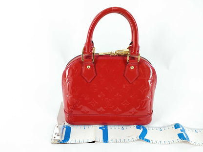 LOUIS VUITTON Vernis Louis Vuitton Alma BB Handbag with Serial Number