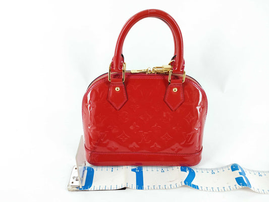 LOUIS VUITTON Vernis Louis Vuitton Alma BB Handbag with Serial Number
