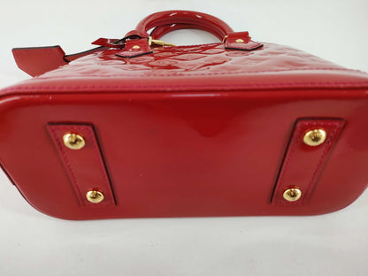 LOUIS VUITTON Vernis Louis Vuitton Alma BB Handbag with Serial Number